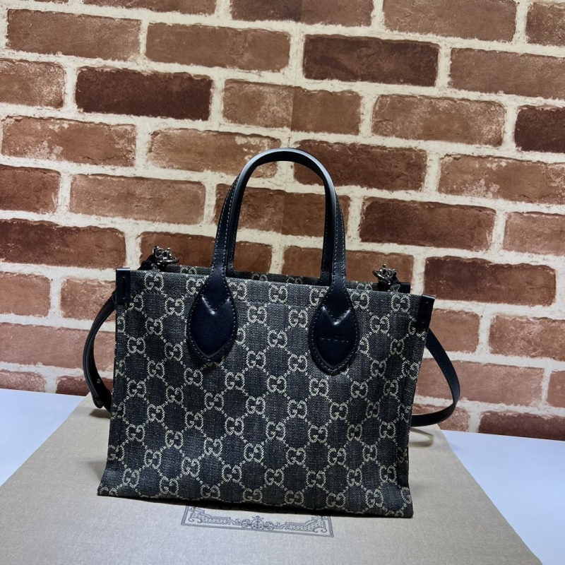 G*u*i shopping bags